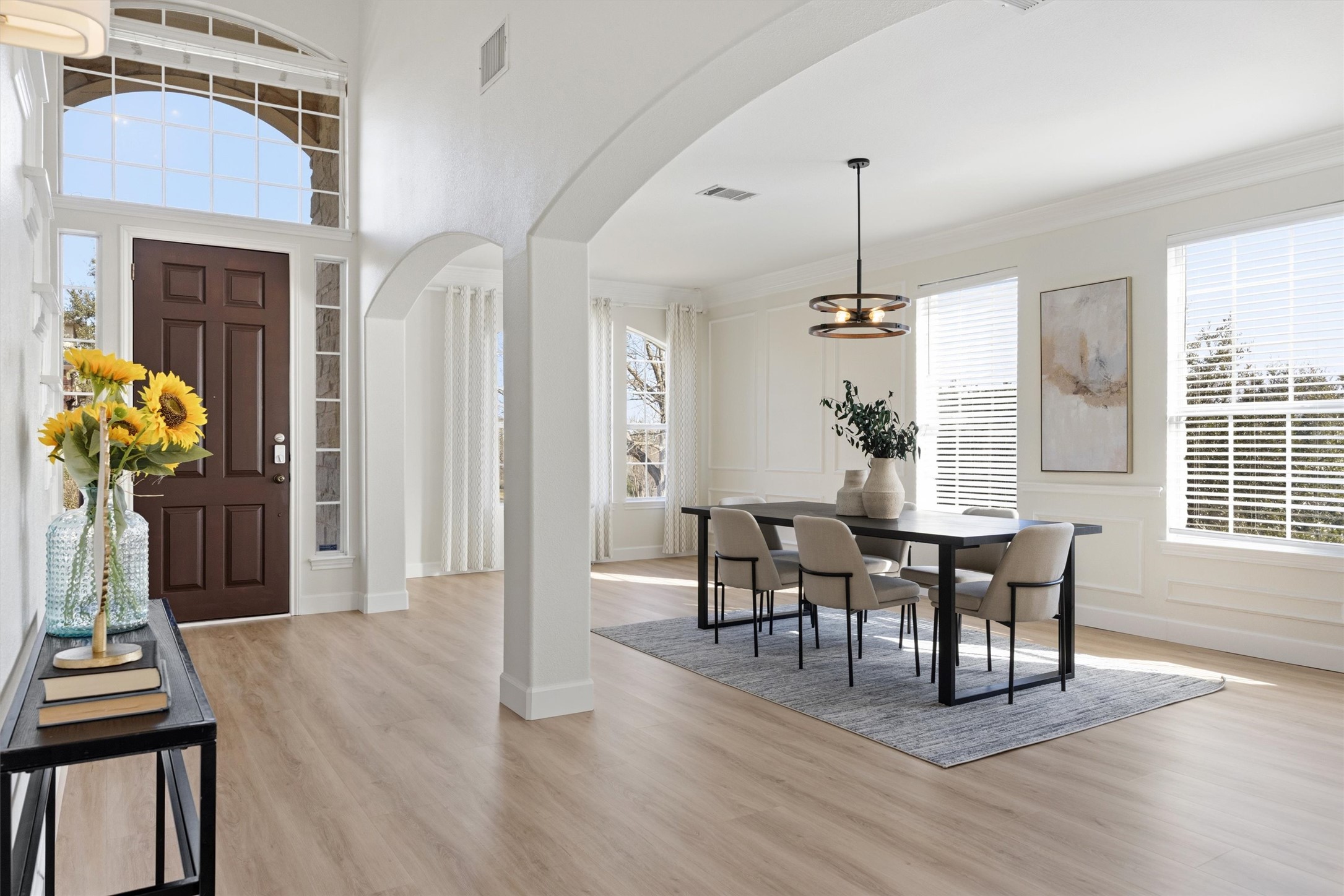 9400 Savannah Ridge Drive Austin, TX 78726 - Photo 7 of 35 a view of a dining room with furniture and wooden floor
