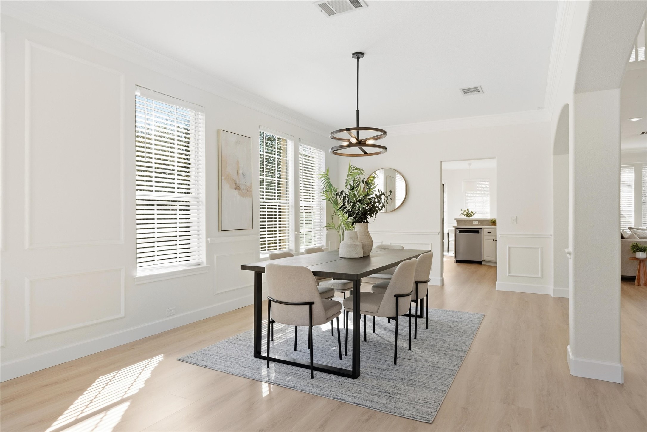 9400 Savannah Ridge Drive Austin, TX 78726 - Photo 8 of 35 a view of a dining room with furniture window and wooden floor