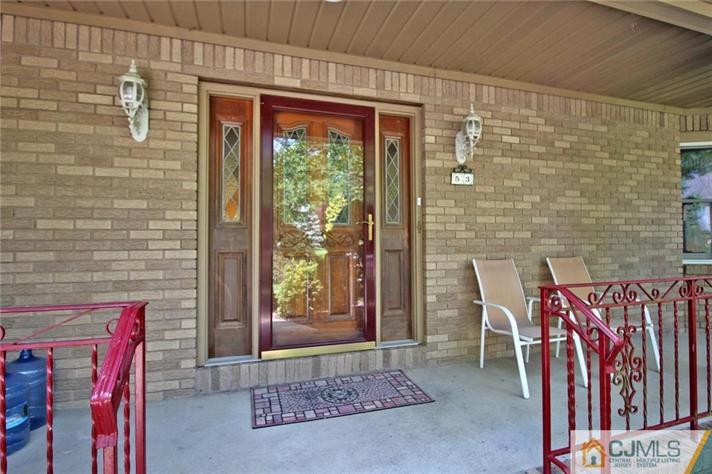 53 Hillsdale Road Edison, NJ 08820 - Photo 2 of 25 a view of an entryway with a rug