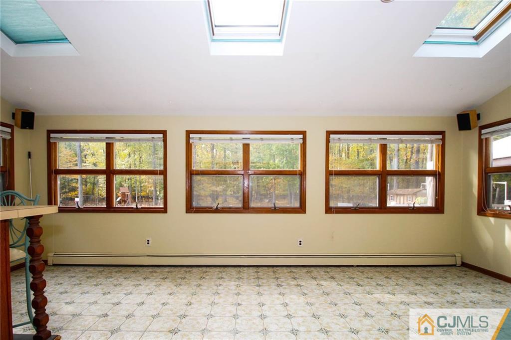 53 Hillsdale Road Edison, NJ 08820 - Photo 12 of 25 a view of an empty room with a window