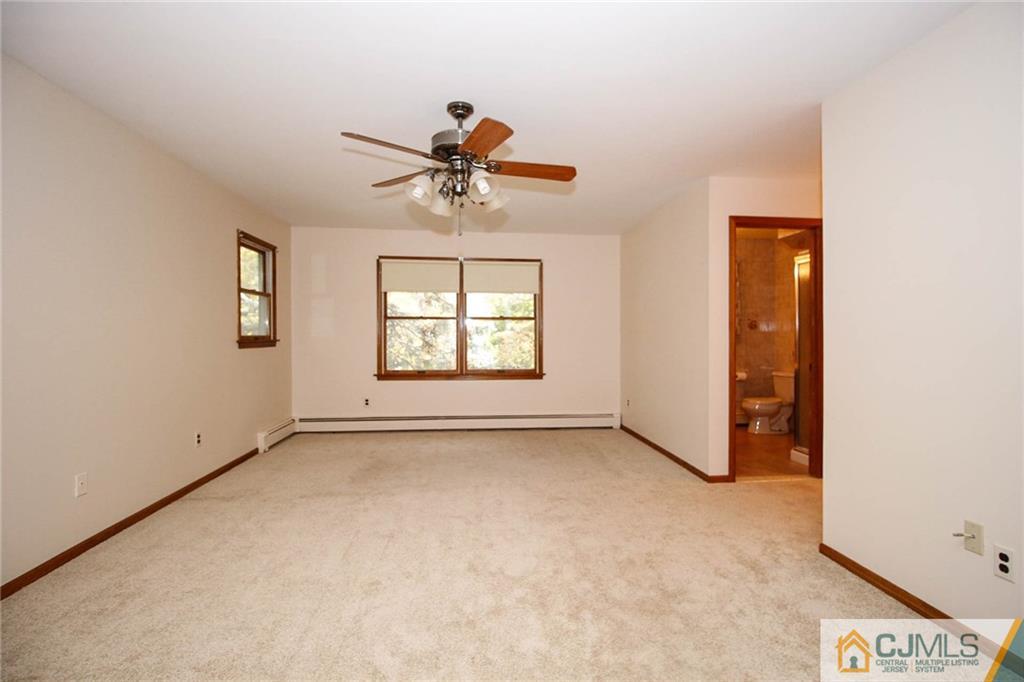 53 Hillsdale Road Edison, NJ 08820 - Photo 16 of 25 an empty room with windows and closet