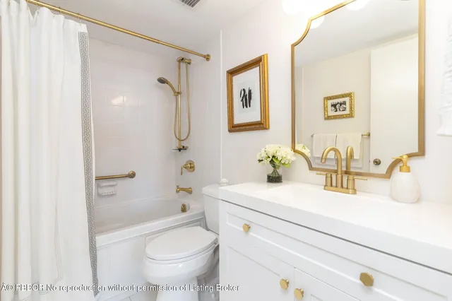 a bedroom with two beds and a large window