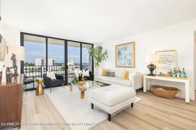 a living room with large windows