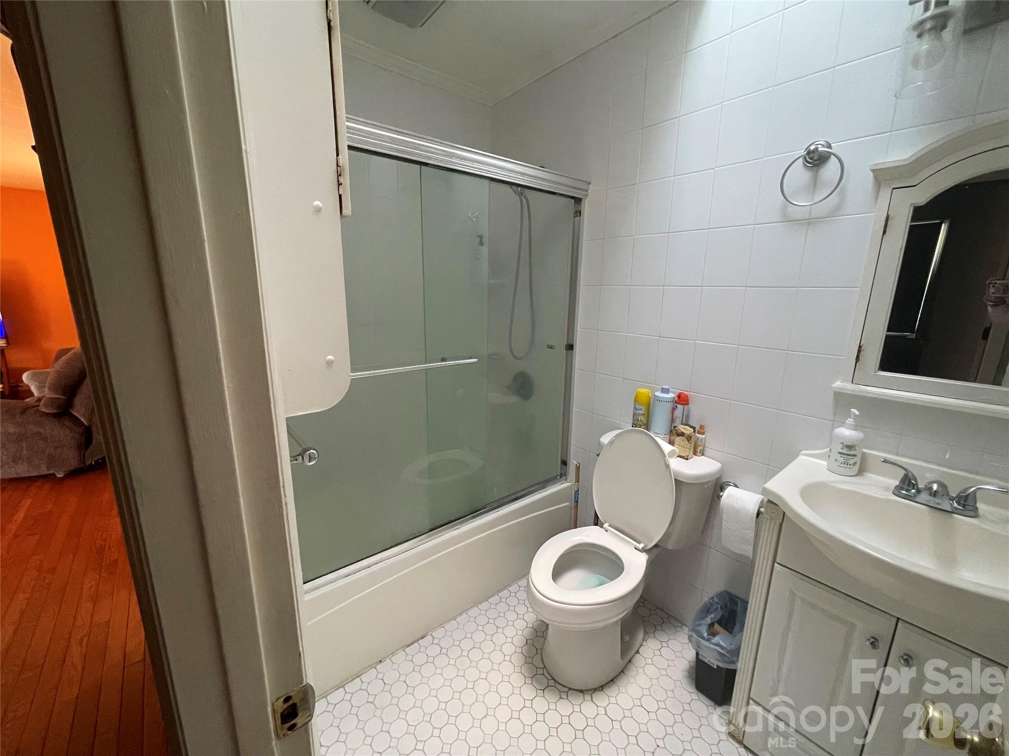 4907 Delmar Griffin Road Monroe, NC 28112 - Photo 12 of 25 a bathroom with a toilet sink and shower