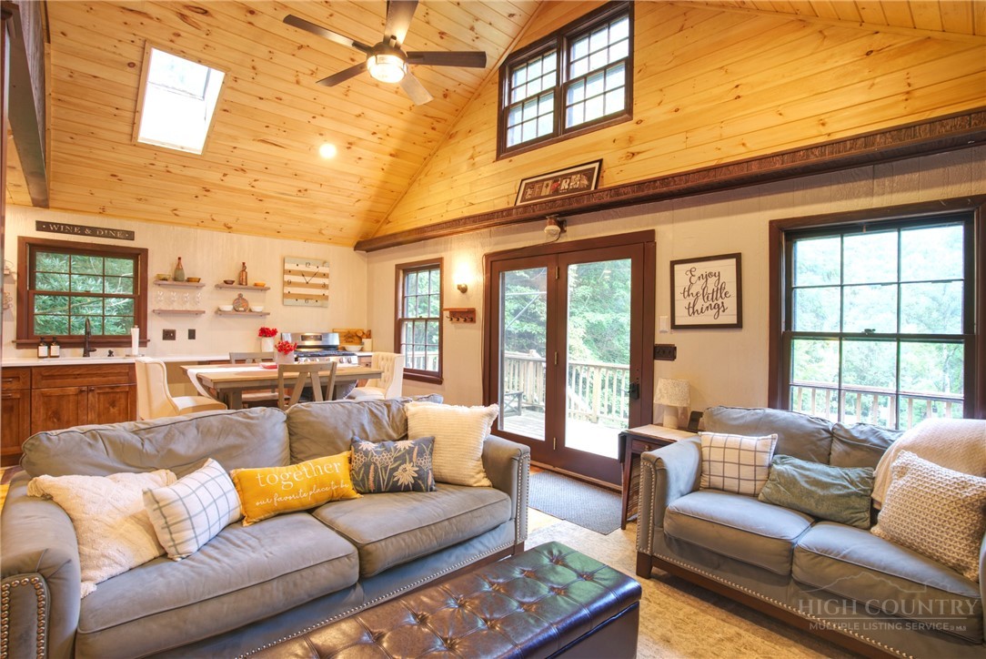 9440 Blackberry Road Lenoir, NC 28645 - Photo 5 of 30 a living room with furniture and a large window