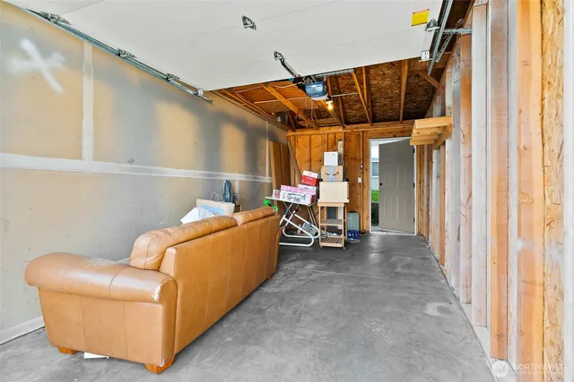 a view of livingroom with furniture and window