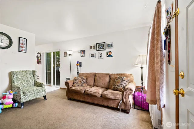 a living room with furniture and a couch