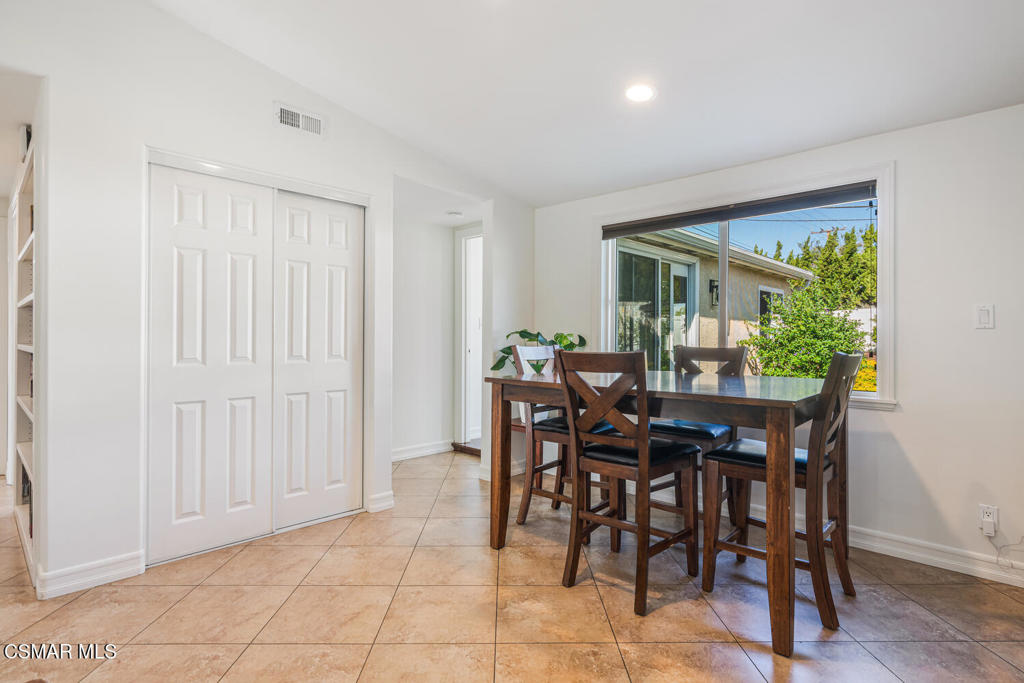 807 Briarcliff Road Thousand Oaks, CA 91360 - Photo 11 of 28 a view of a dining room with furniture and a potted plant