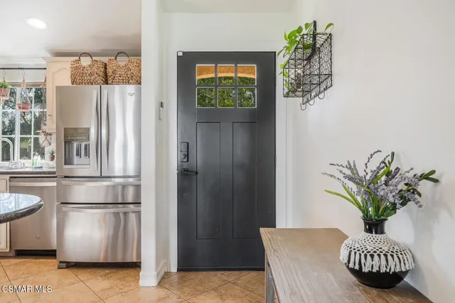 a outdoor dining room with furniture window and wooden floor