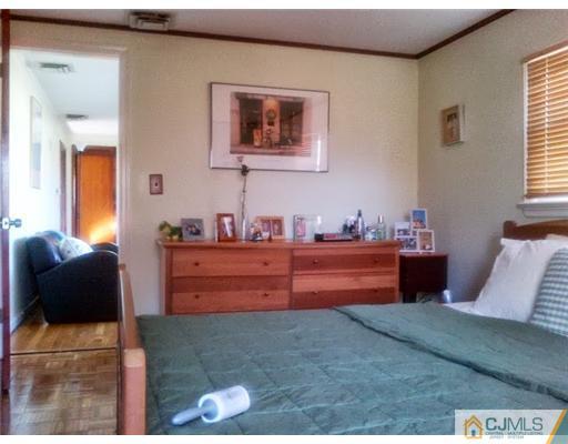 179 South Hill Road Colonia, NJ 07067 - Photo 4 of 19 a room with furniture and window