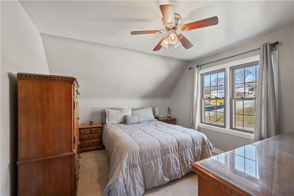 1006 Greenhill Road Pittsburgh, PA 15209 - Photo 12 of 24 a bedroom with a bed and a window