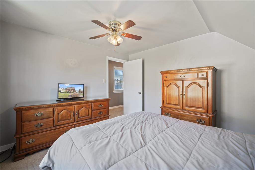 1006 Greenhill Road Pittsburgh, PA 15209 - Photo 13 of 24 a bedroom with a bed and a dresser