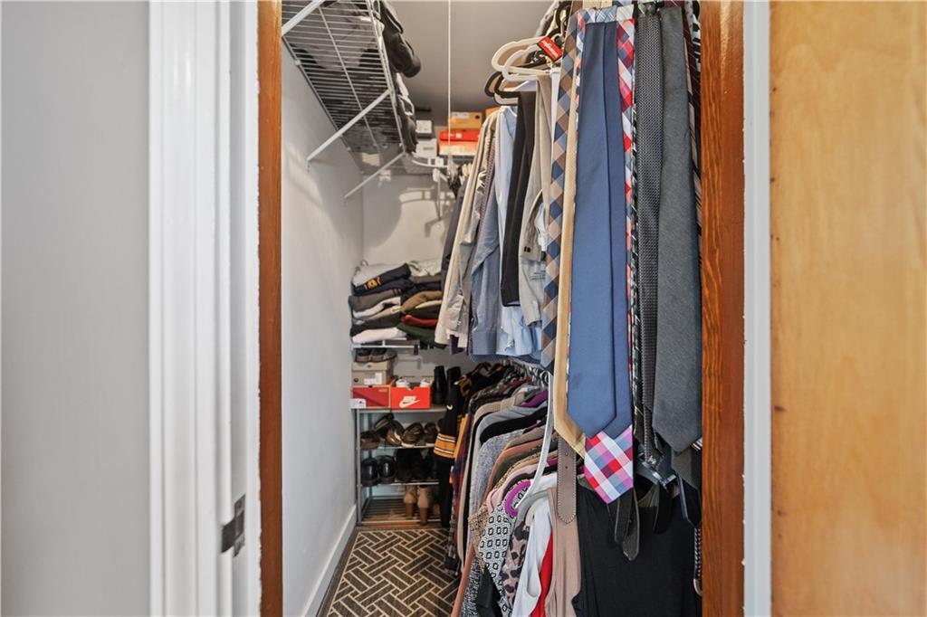 1006 Greenhill Road Pittsburgh, PA 15209 - Photo 14 of 24 a view of walk in closet with clothes
