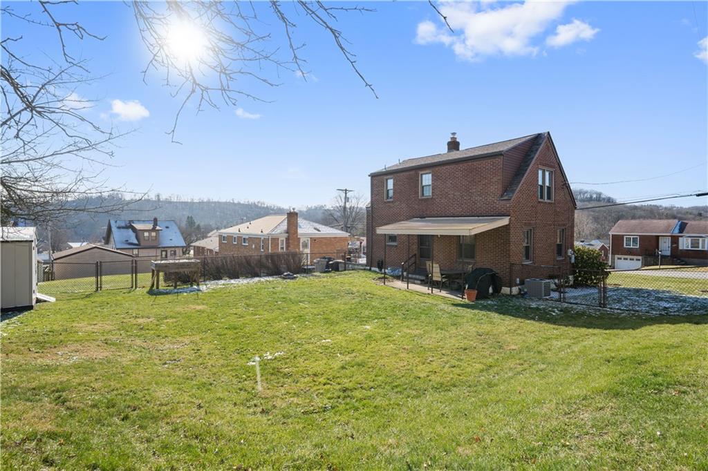 1006 Greenhill Road Pittsburgh, PA 15209 - Photo 22 of 24 a house view with a swimming pool