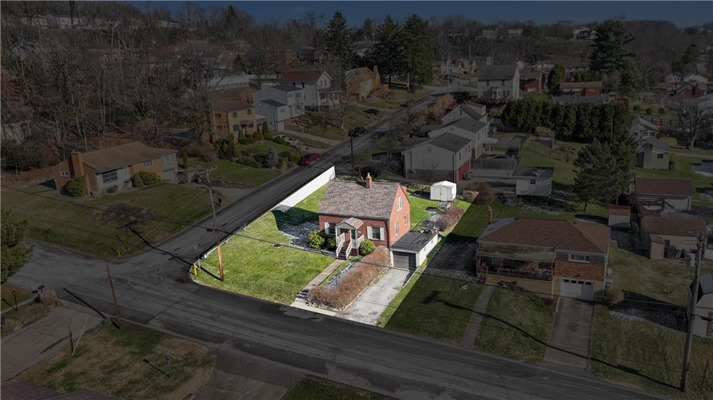 1006 Greenhill Road Pittsburgh, PA 15209 - Photo 24 of 24 an aerial view of a house with a yard