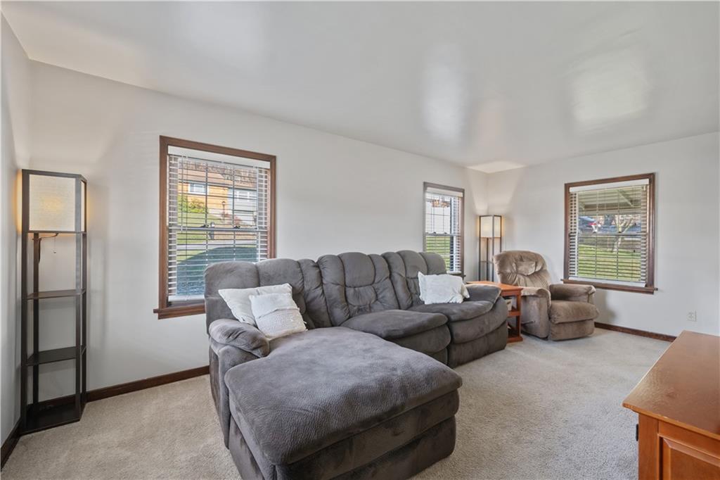 1006 Greenhill Road Pittsburgh, PA 15209 - Photo 5 of 24 a living room with furniture and windows