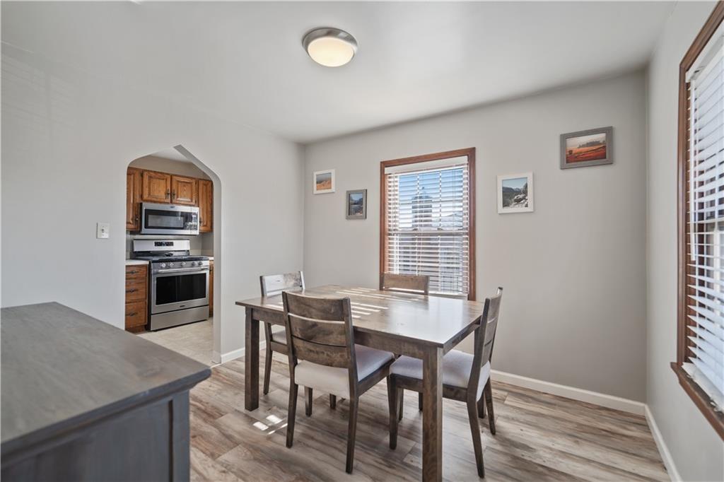 1006 Greenhill Road Pittsburgh, PA 15209 - Photo 8 of 24 a view of a dining room with furniture and a window