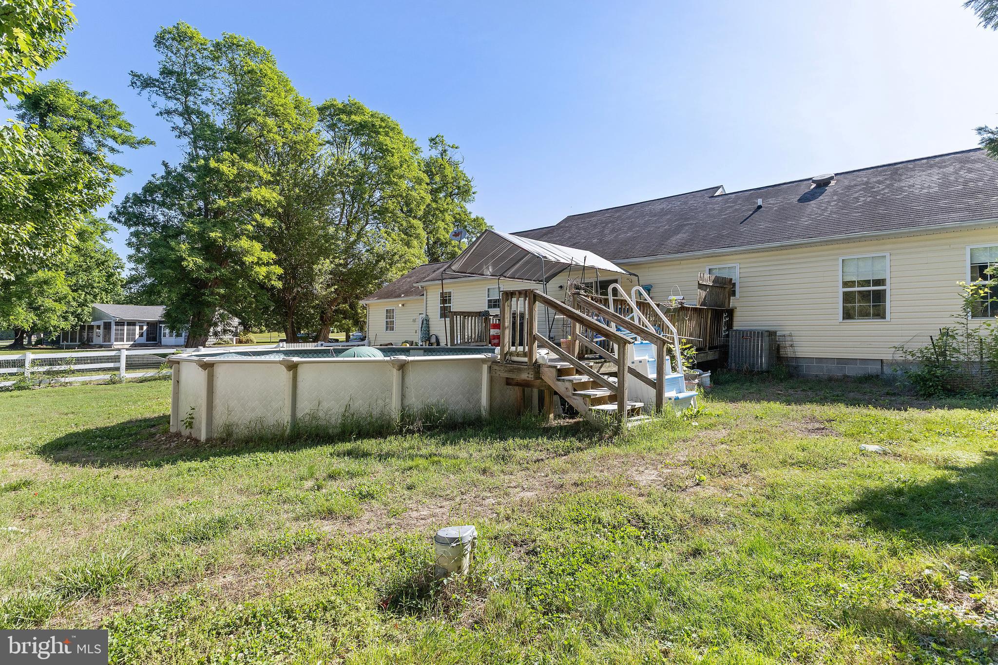 7112 East New Market Ellwood Road Hurlock, MD 21643 - Photo 24 of 41 a view of a house with a yard