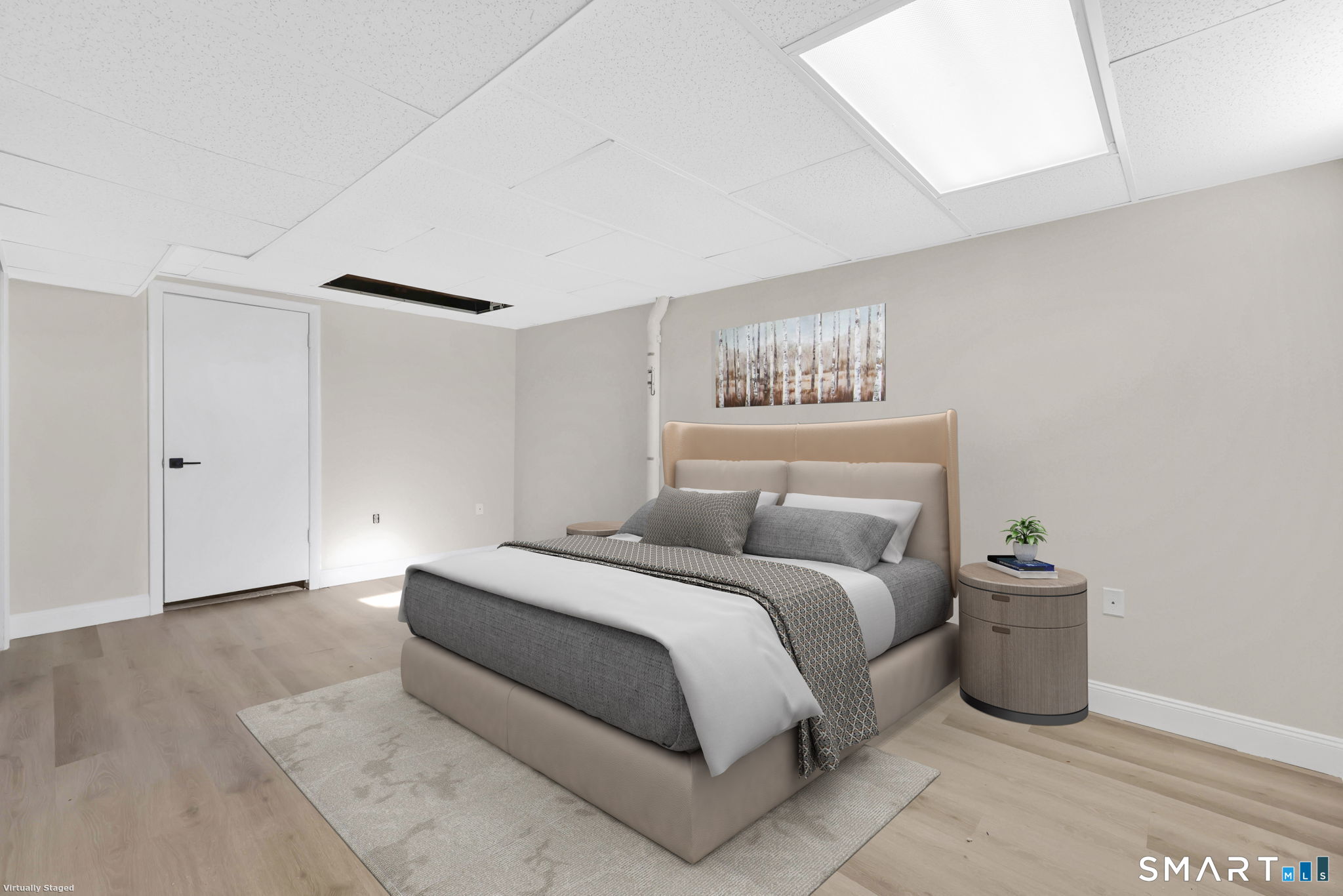 273 Cottonwood Road, Unit 273 Newington, CT 06111 - Photo 26 of 38 a bedroom with a bed and a table