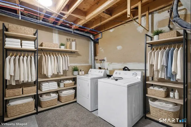a utility room with dryer and washer