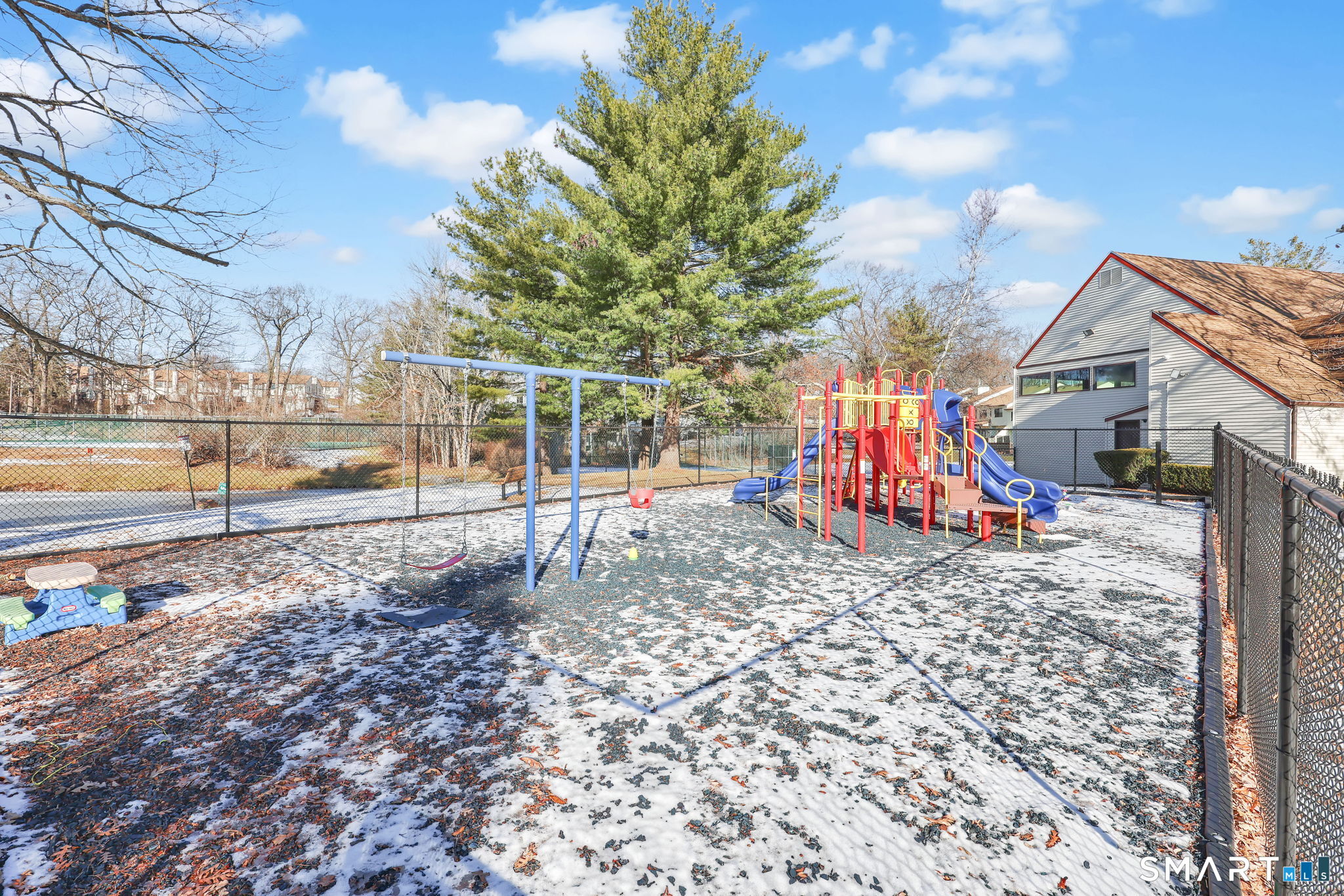 273 Cottonwood Road, Unit 273 Newington, CT 06111 - Photo 37 of 38 a view of a park with iron fence