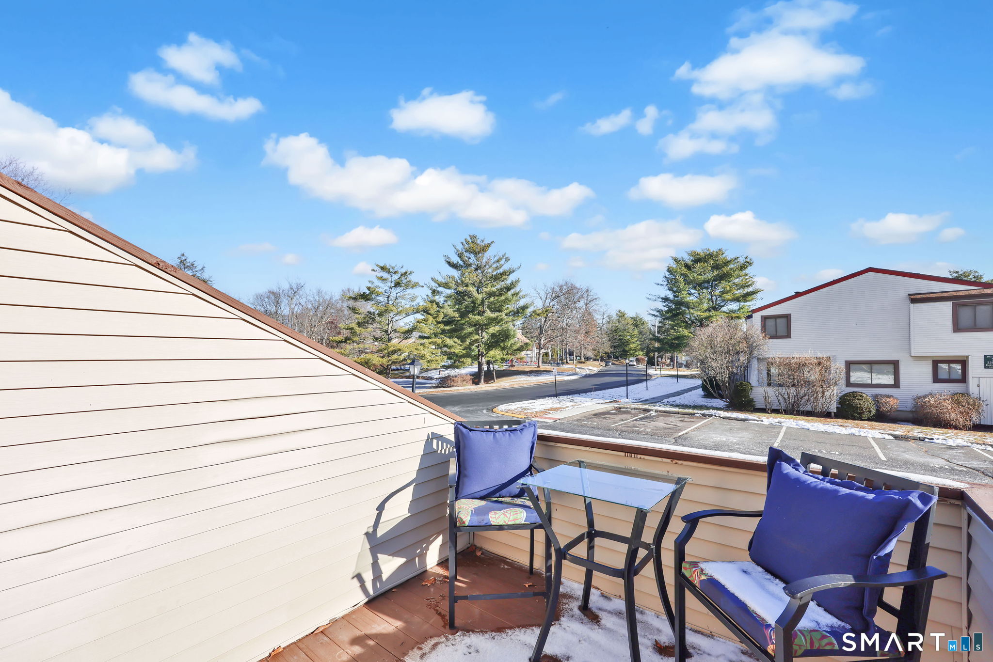 273 Cottonwood Road, Unit 273 Newington, CT 06111 - Photo 7 of 38 a view of a patio with table and chairs and potted plants