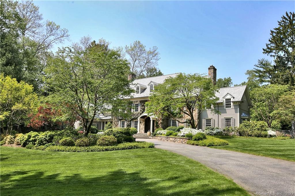 39 Red Coat Road Westport, CT 06880 - Photo 1 of 1 a front view of a house with a garden