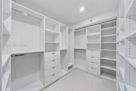 a view of an empty walk in closet