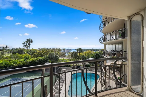 a view of a balcony with an outdoor space