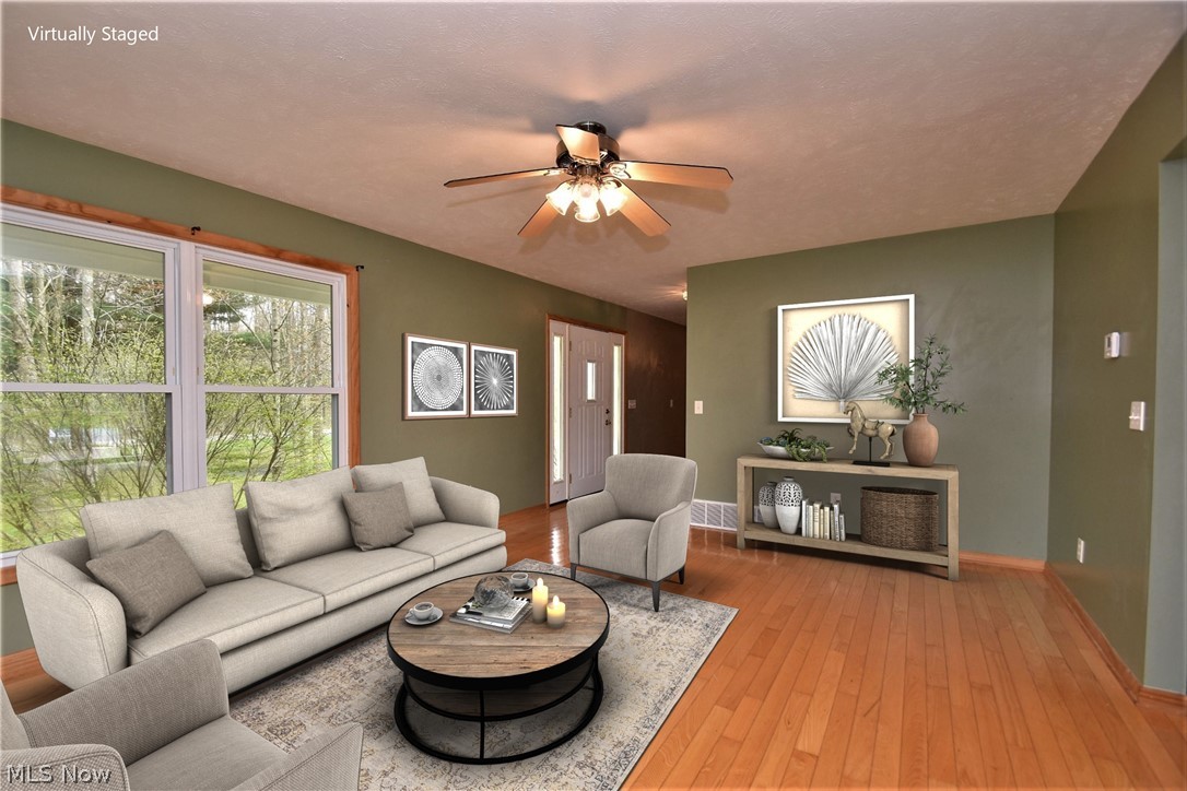 16895 Messenger Road Chagrin Falls, OH 44023 - Photo 16 of 33 Warm inviting Living Room with Extra Large Windows.