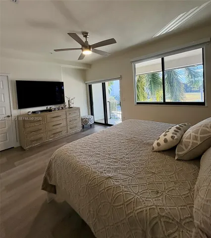 a view of a bathroom with a glass door shower