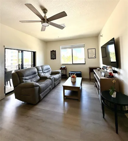 a view of a balcony with furniture