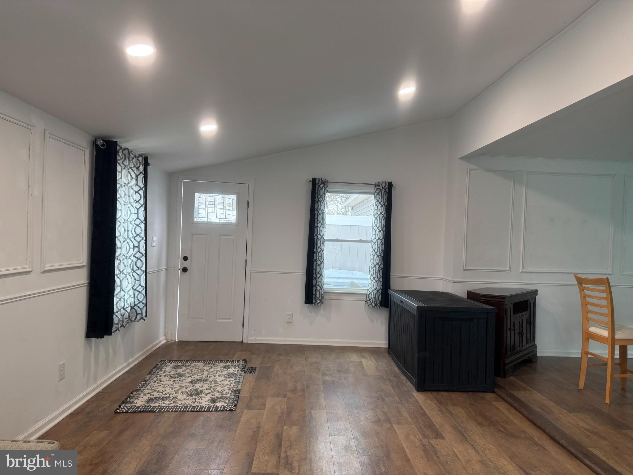 33987 Sunflower Road, Unit 3831 Lewes, DE 19958 - Photo 4 of 17 a view of empty room with wooden floor