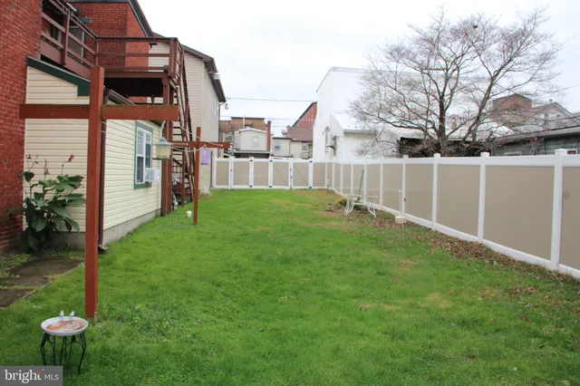 a view of a backyard with a garden