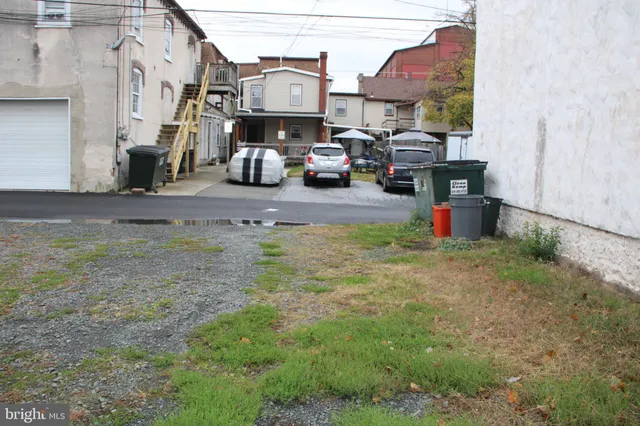 a view of a street with cars