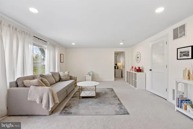 a living room with furniture and a couch
