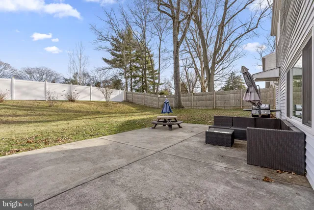 a view of a patio with a yard