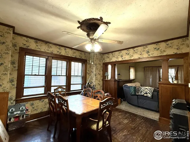 a view of a livingroom with furniture and windows