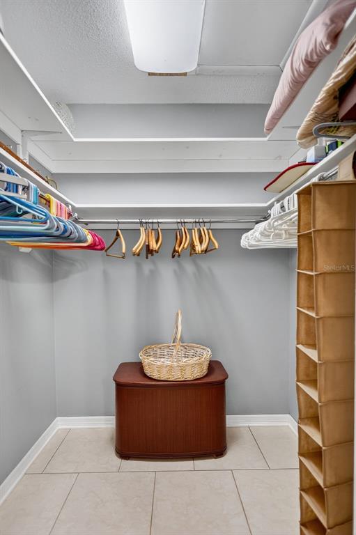 14 Strathmore Boulevard, Unit 14 Sarasota, FL 34233 - Photo 22 of 42 a room with a utility room and cabinets