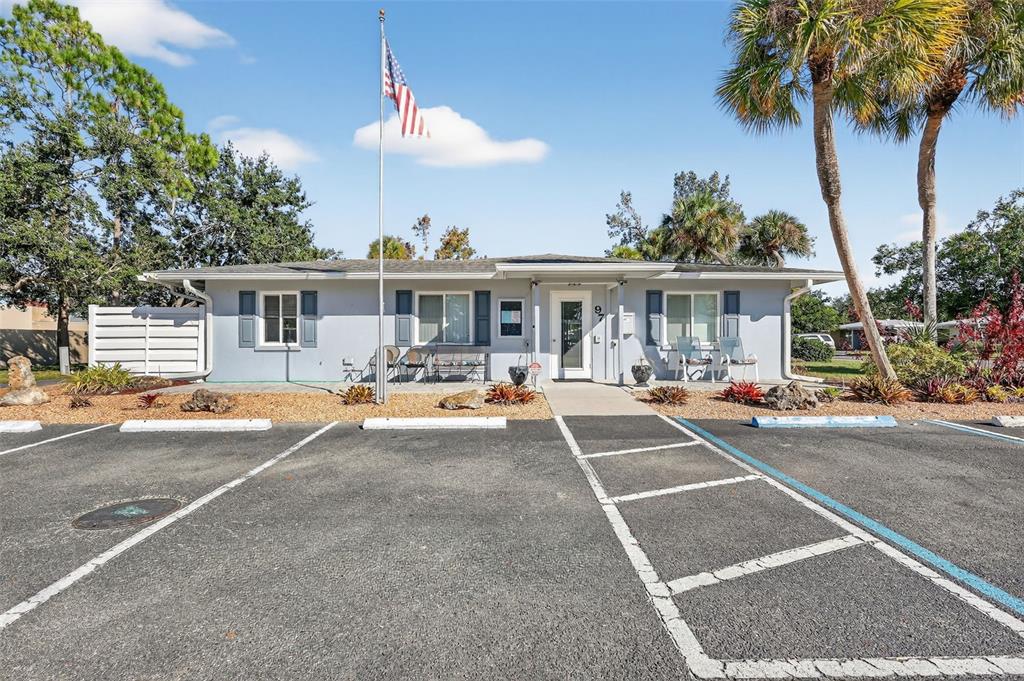 14 Strathmore Boulevard, Unit 14 Sarasota, FL 34233 - Photo 34 of 42 a view of a house with swimming pool and sitting area