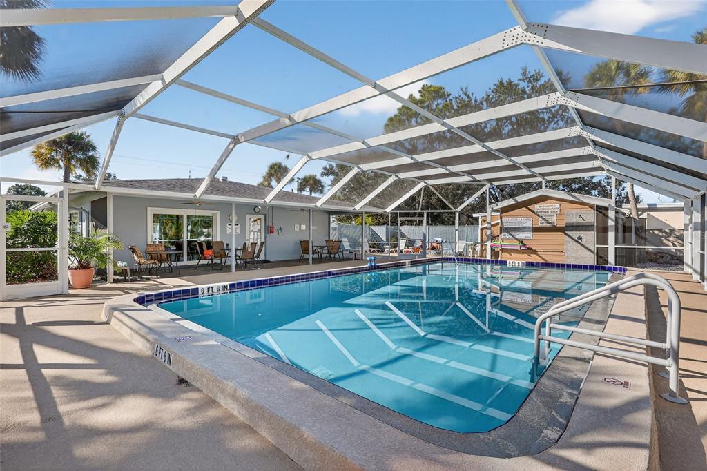 14 Strathmore Boulevard, Unit 14 Sarasota, FL 34233 - Photo 42 of 42 a view of a swimming pool with sitting area