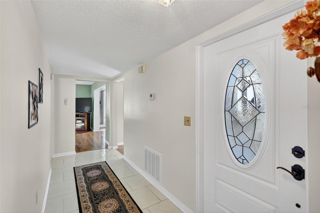 14 Strathmore Boulevard, Unit 14 Sarasota, FL 34233 - Photo 5 of 42 a bathroom with a bathtub and shower