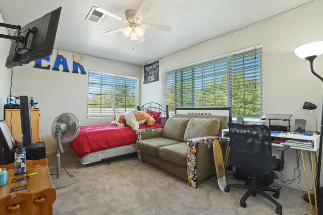 a bathroom with a glass door shower