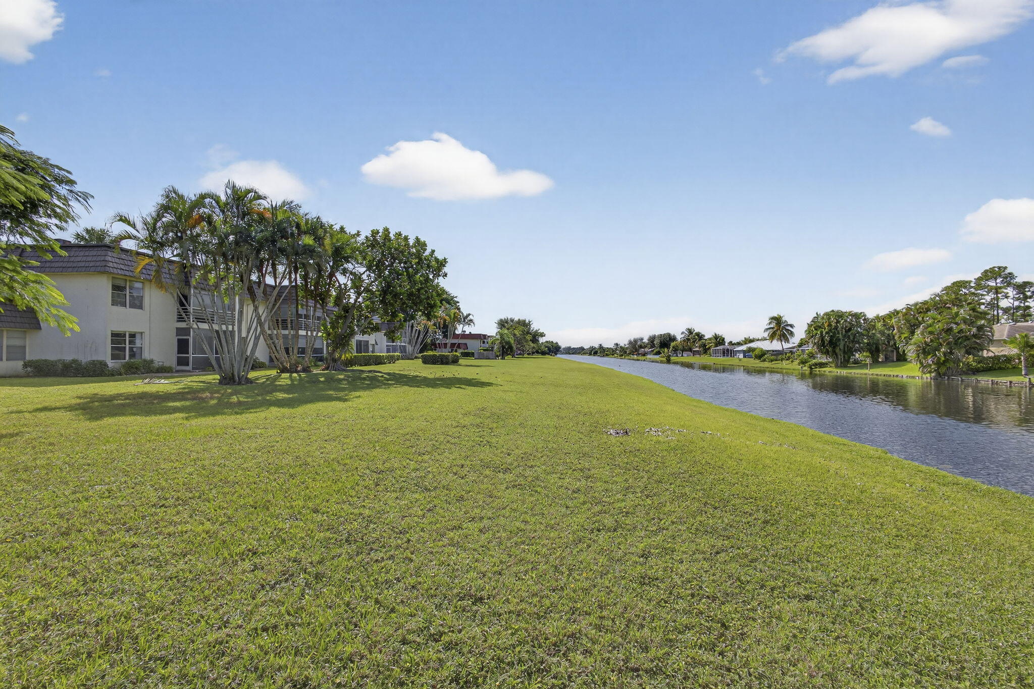 12001 Poinciana Boulevard, Unit 204 Royal Palm Beach, FL 33411 - Photo 1 of 42 CANAL VIEW