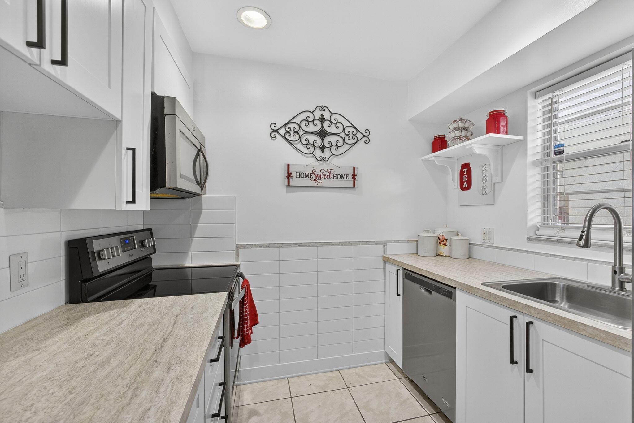 12001 Poinciana Boulevard, Unit 204 Royal Palm Beach, FL 33411 - Photo 14 of 42 Kitchen