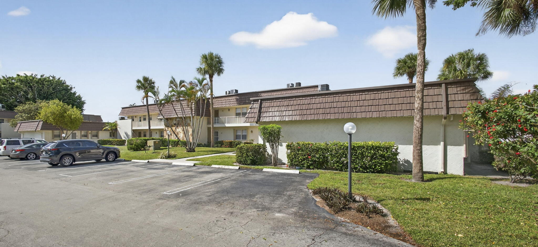 12001 Poinciana Boulevard, Unit 204 Royal Palm Beach, FL 33411 - Photo 2 of 42 FRONT VIEW