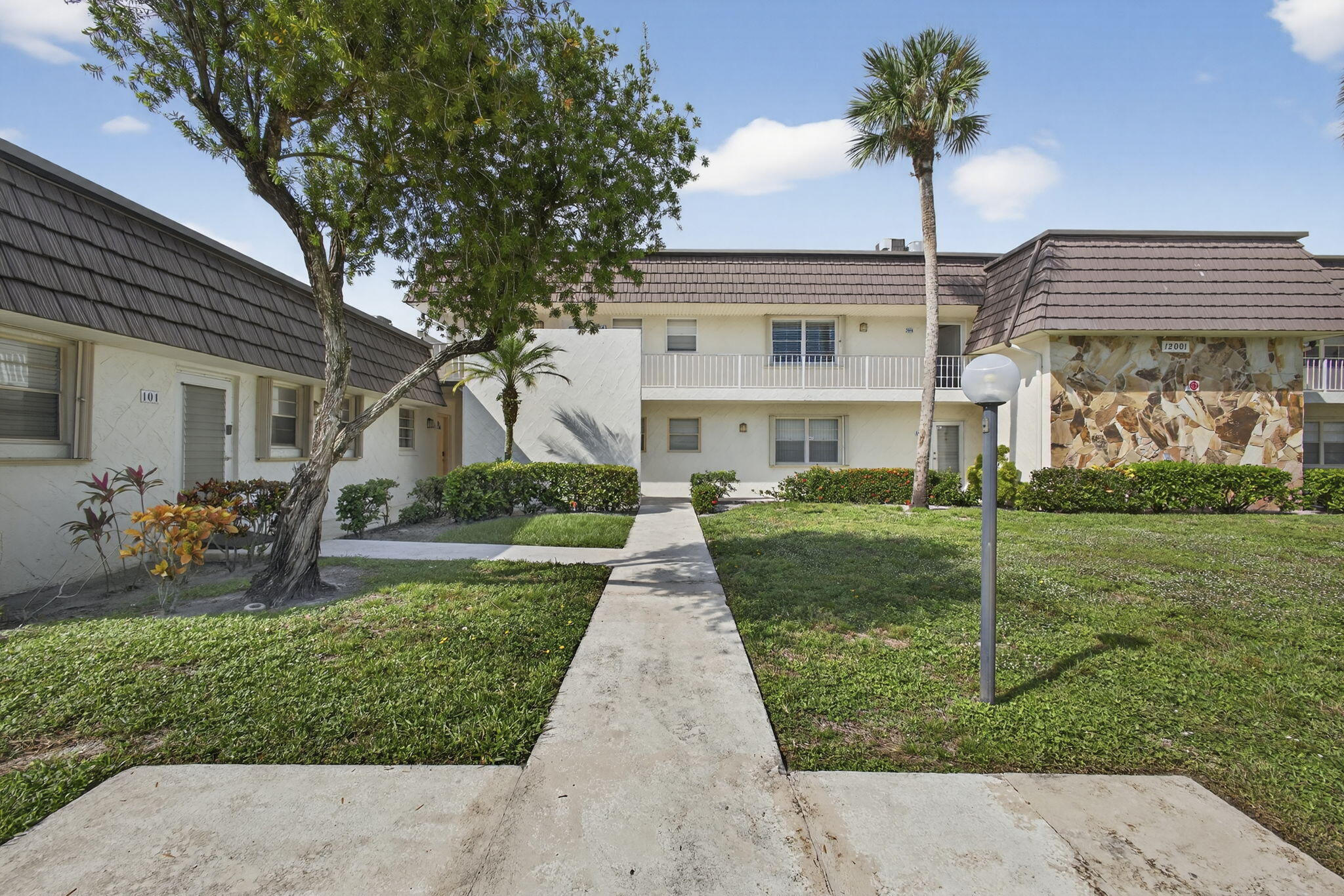12001 Poinciana Boulevard, Unit 204 Royal Palm Beach, FL 33411 - Photo 40 of 42 FRONT VIEW