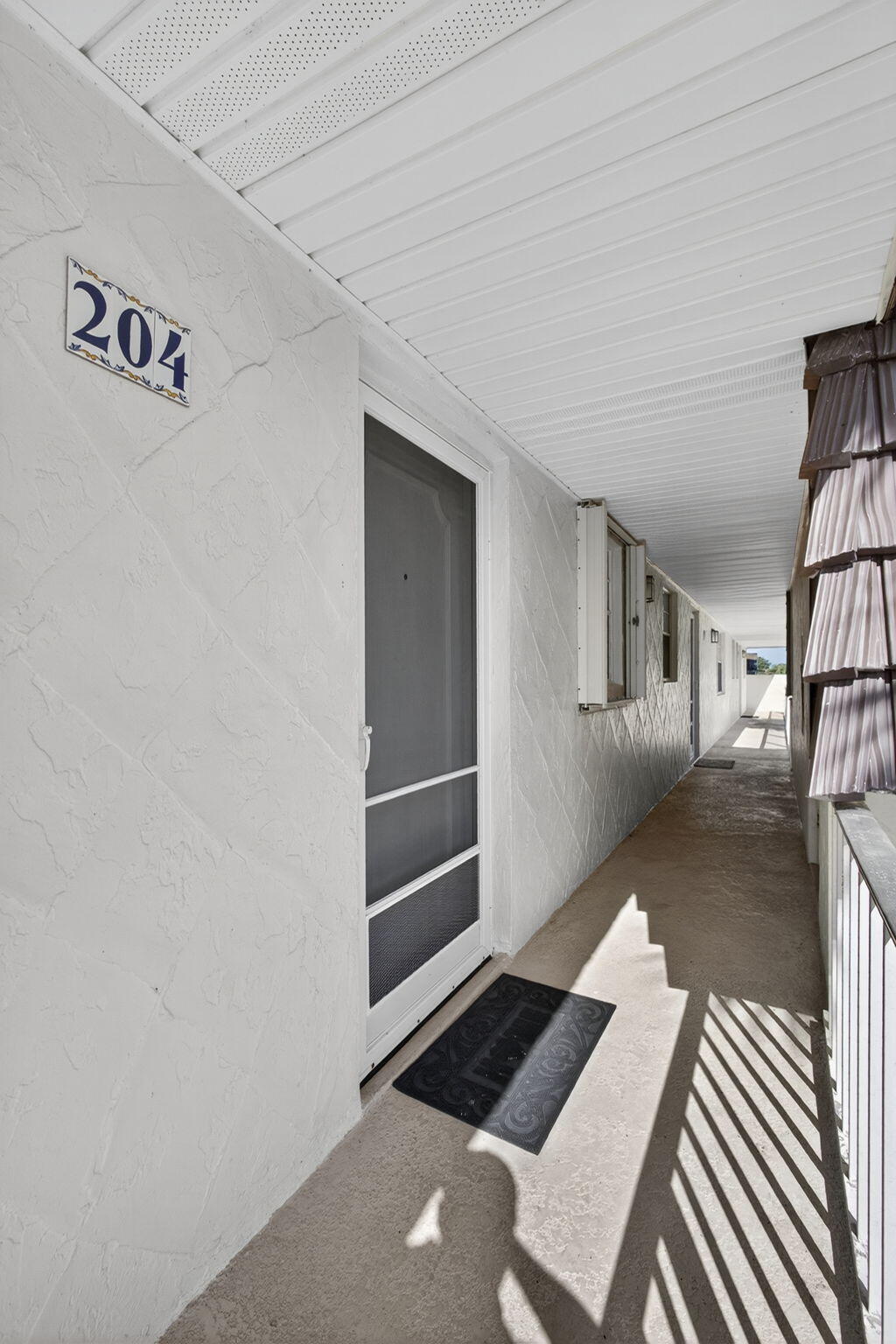 12001 Poinciana Boulevard, Unit 204 Royal Palm Beach, FL 33411 - Photo 8 of 42 Unit number