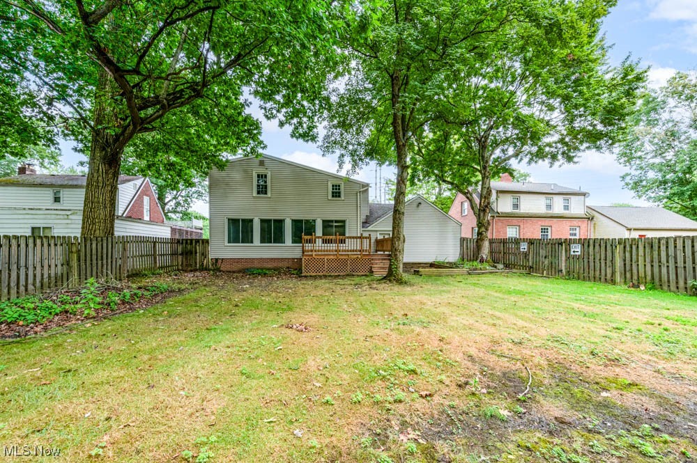 272 Ewing Road Youngstown, OH 44512 - Photo 2 of 19 Back of property featuring a deck, patio and a fenced backyard