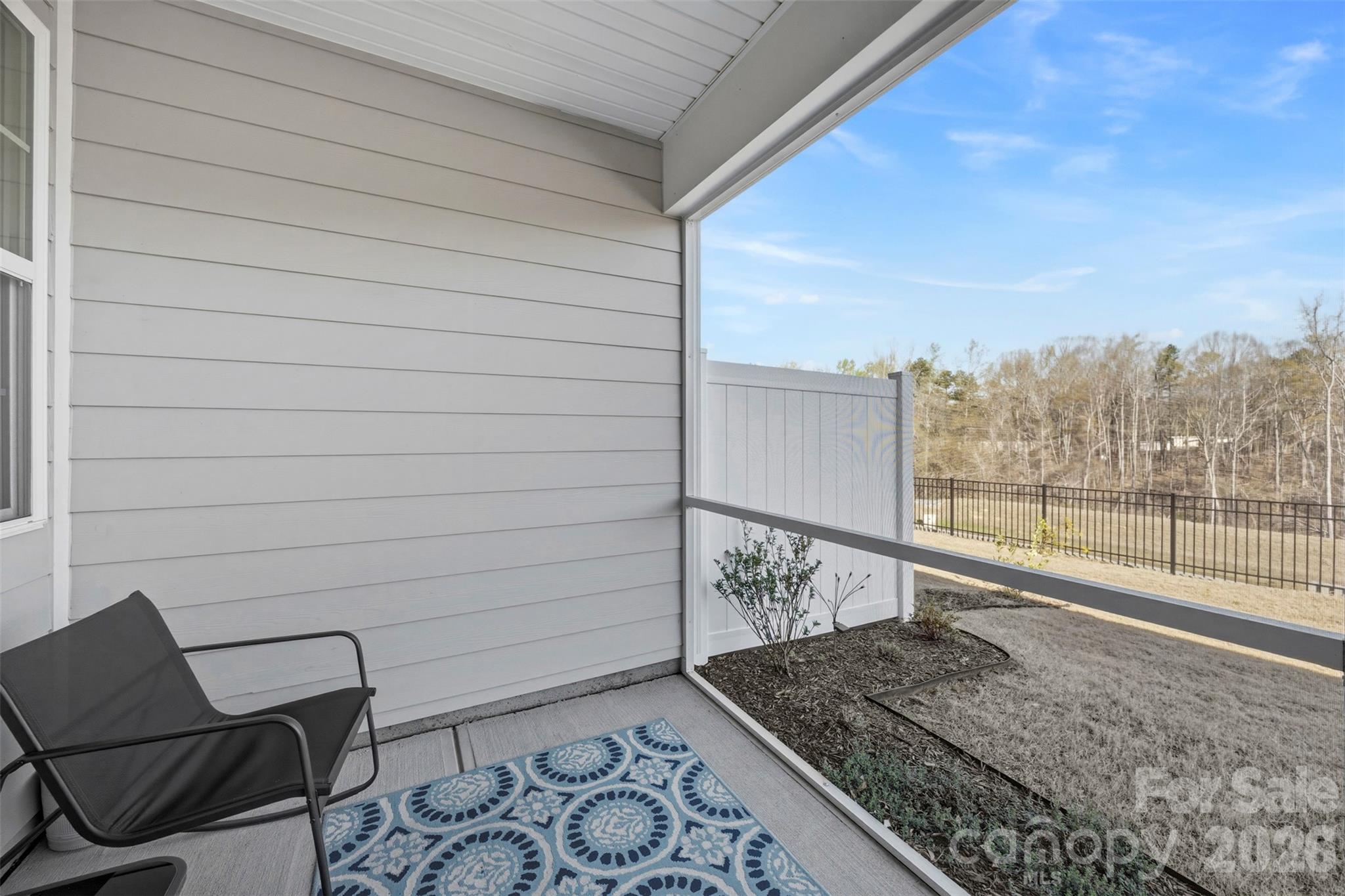 5030 Moss Pne Way Fort Mill, SC 29708 - Photo 11 of 28 a view of a terrace with wooden floor and chair